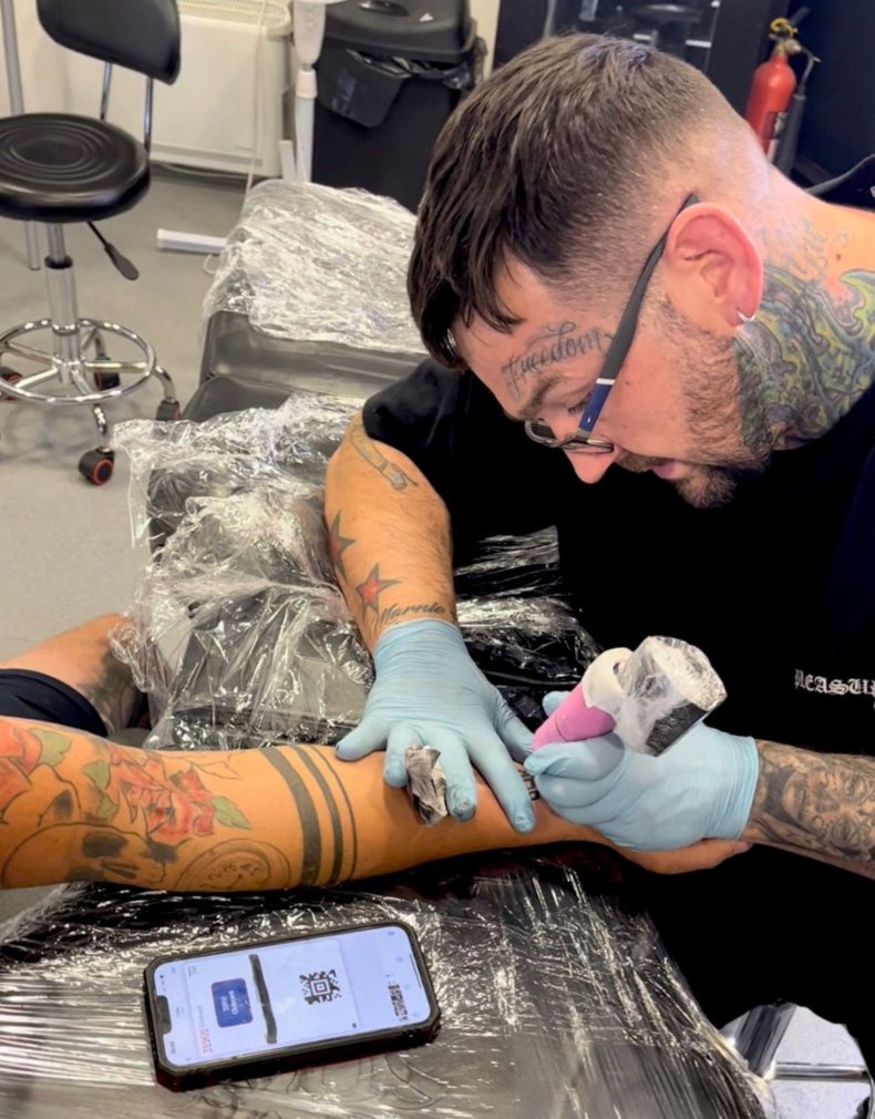 Dean Mayhew's arm QR code tattoo