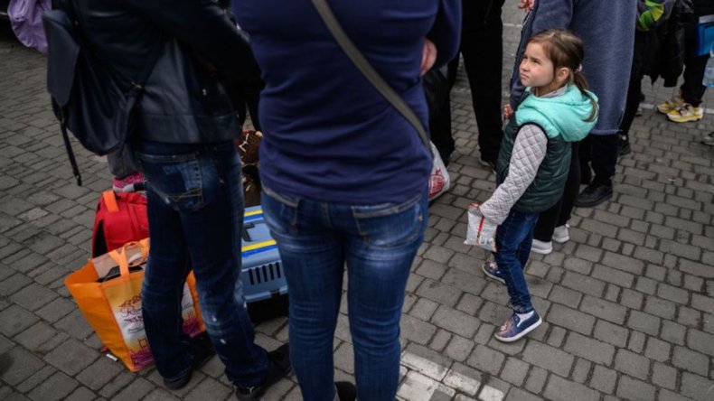 Refugees board bus in Ukraine