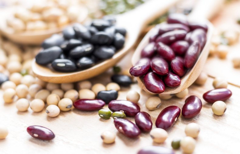 Spoonfuls of different beans.