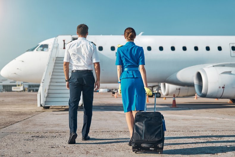 Flight Attendants Boarding Plane