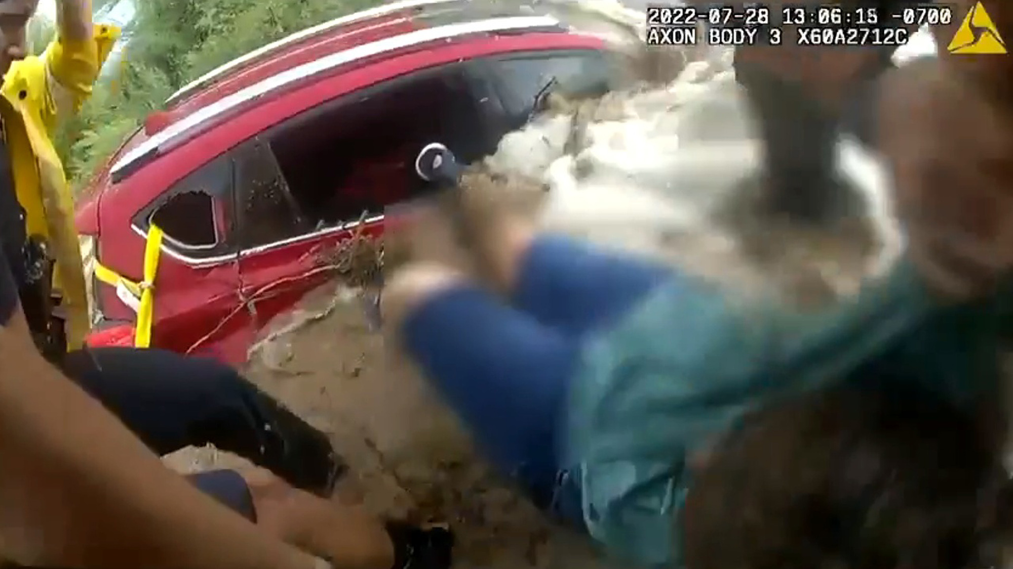 Distraught Arizona Woman Rescued From Flooding Car Without Her Dog
