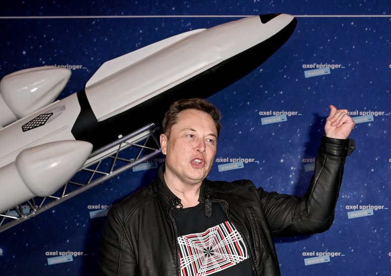 Elon Musk poses for the press 