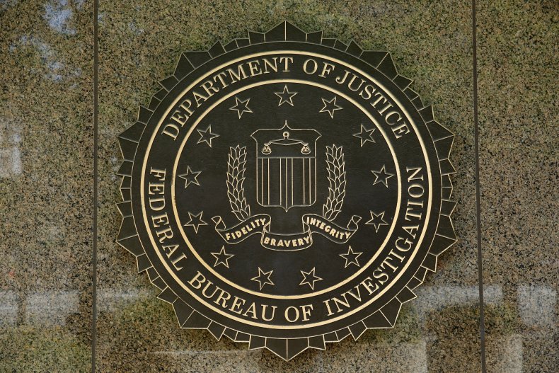 The FBI seal is seen outside the