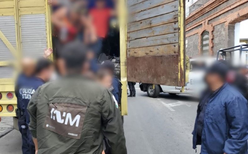 pMigrants found in the truck in Puebla, Mexico, in an undated photo. They were rescued and the driver and copilot were arrested. (@INAMI_mx/Zenger)/p