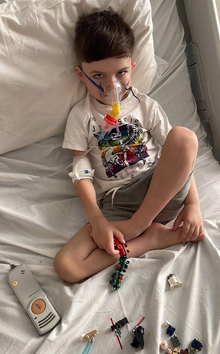 Albie Tilford in hospital bed