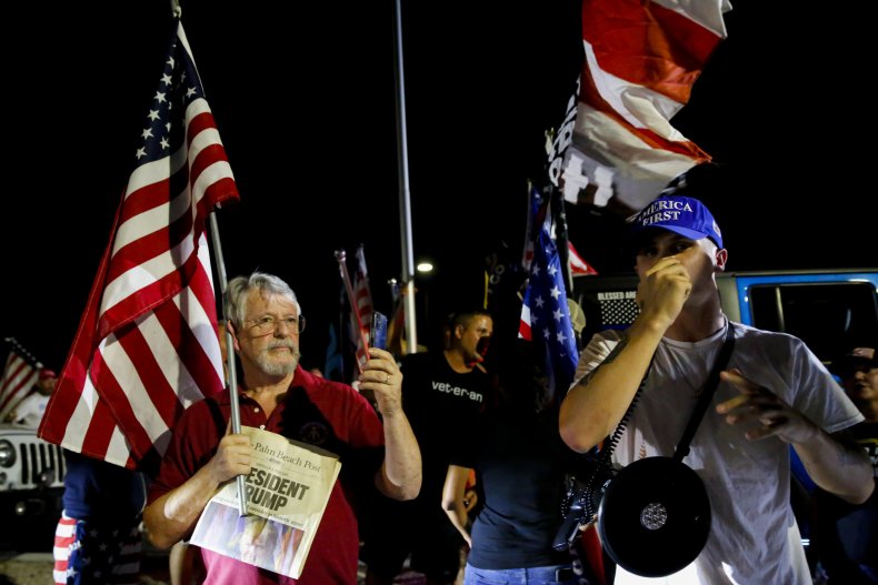 Donald Trump protest attendee shouts into bullhorn