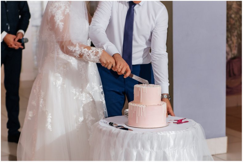 Wedding couple with a cake 
