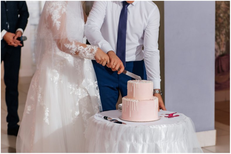 Wedding couple with a cake