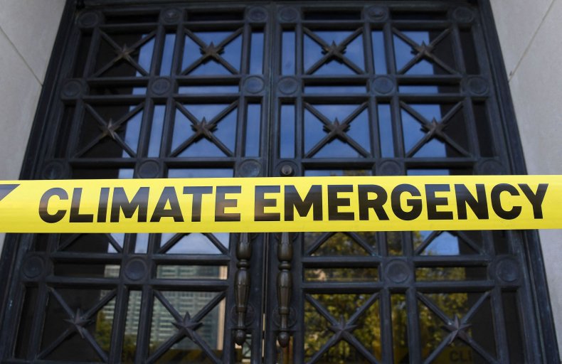 "Climate Emergency" yellow tape
