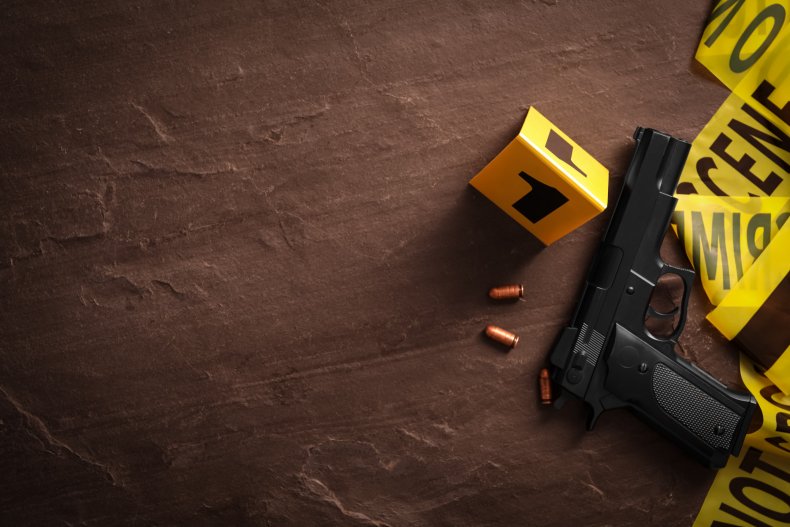 gun shell casings crime scene tape evidence