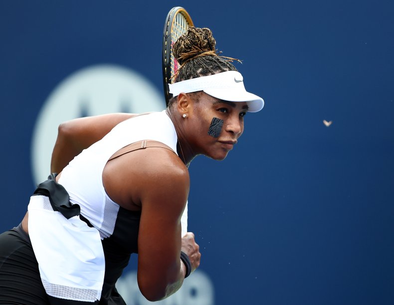 Serena Williams serves 