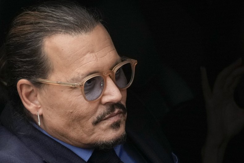 Johnny Depp leaves a courthouse 