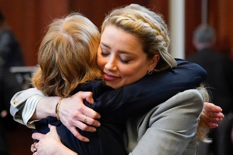 Amber Heard hugs Elaine Bredehoft in court