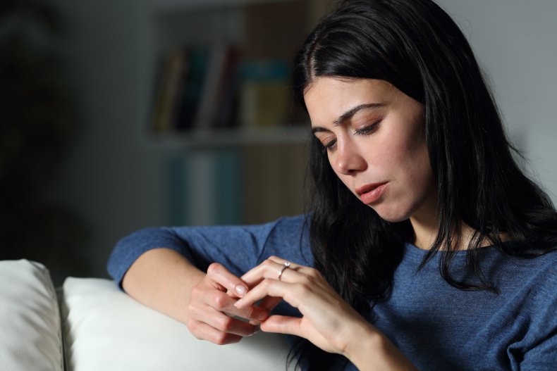 Woman looking at ring