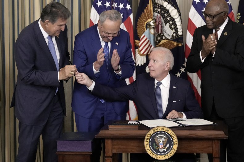 Biden signing a bill into law
