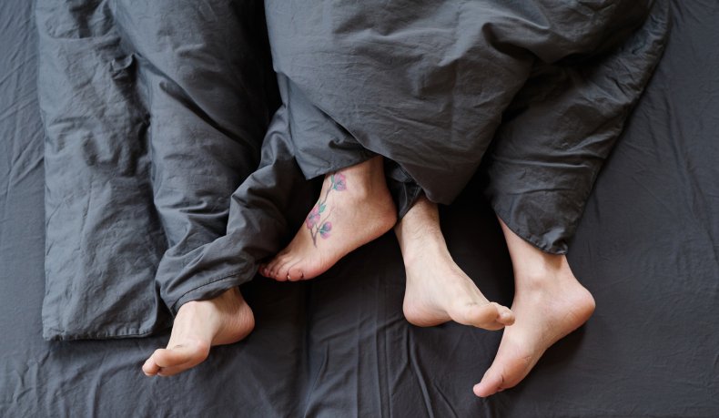 A couple in bed