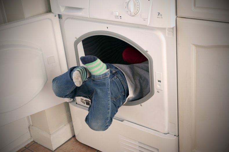 kid inside dryer