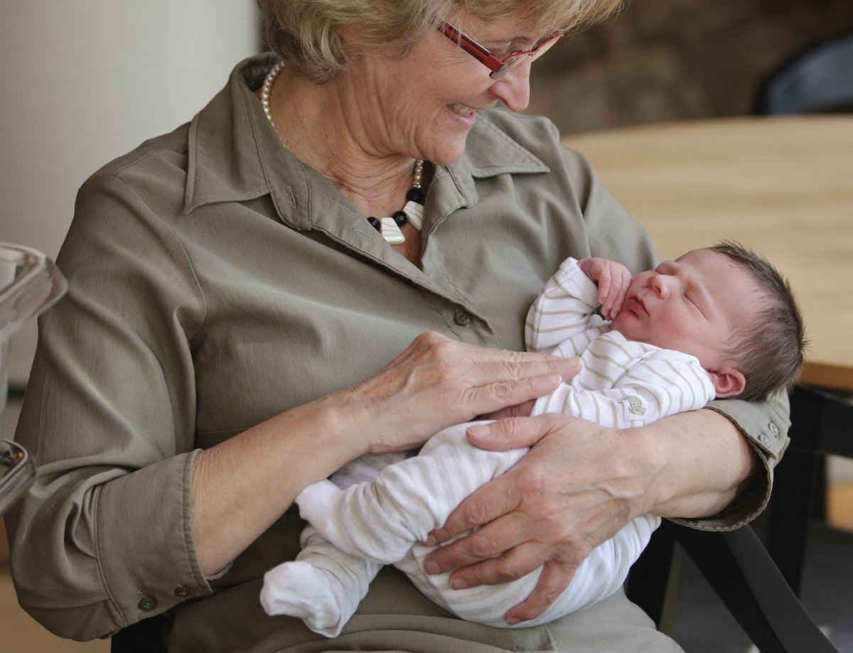 File photo of elderly woman and baby.
