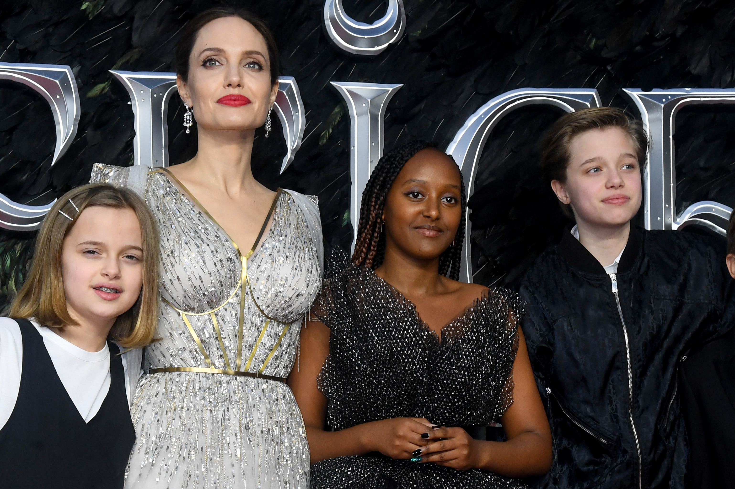 Angelina Jolie holds hands with daughter Zahara, 17, in Rome