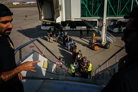 Afghans evacuate