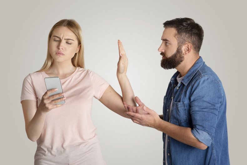 Couple arguing over a phone call
