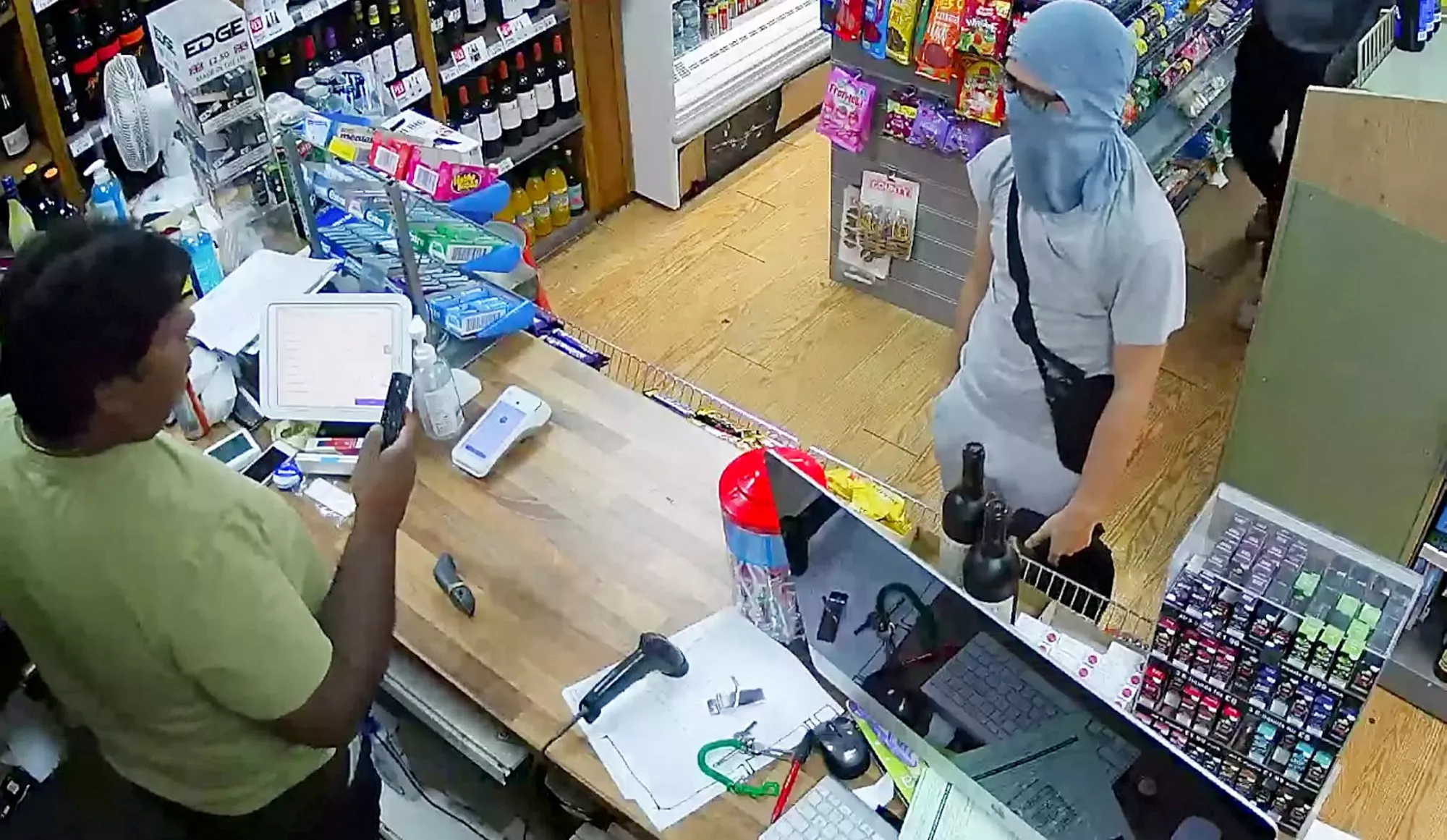 Watch: Store Owner, a Former Cop, Thwarts Robbery With Bottle of Vodka - Vimarsana News