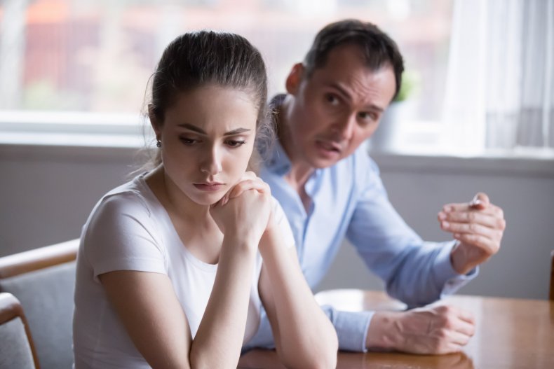 Father chastising daughter