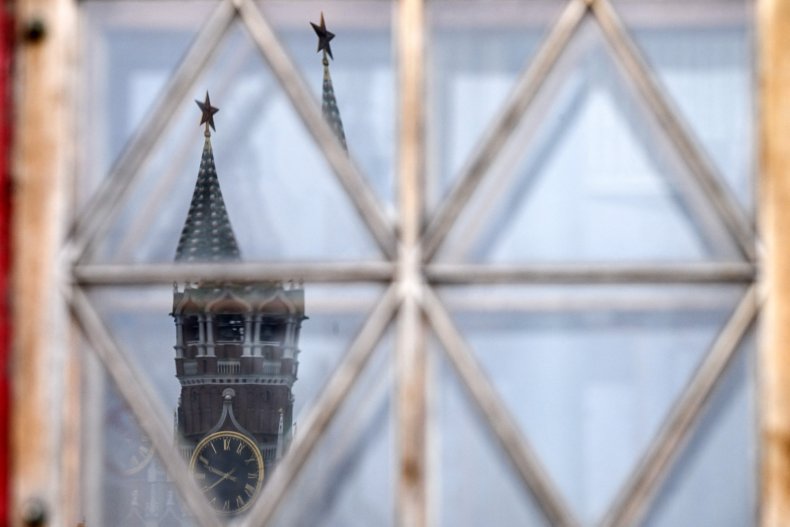 Kremlin's Spasskaya tower is reflected 
