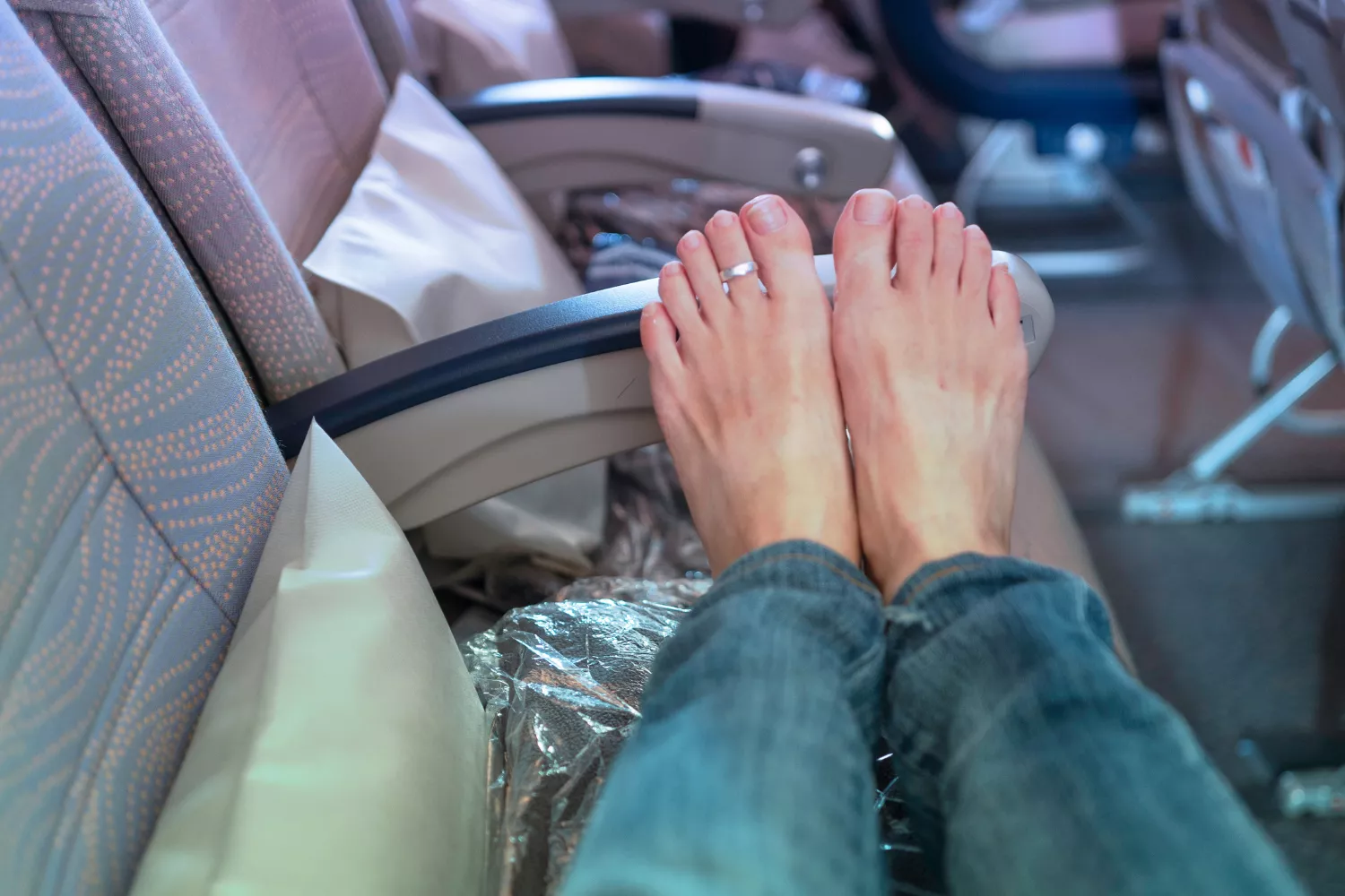 Disgust as Man Keeps Touching Plane Passenger With His Bare Feet: 'Trashy' - Vimarsana News
