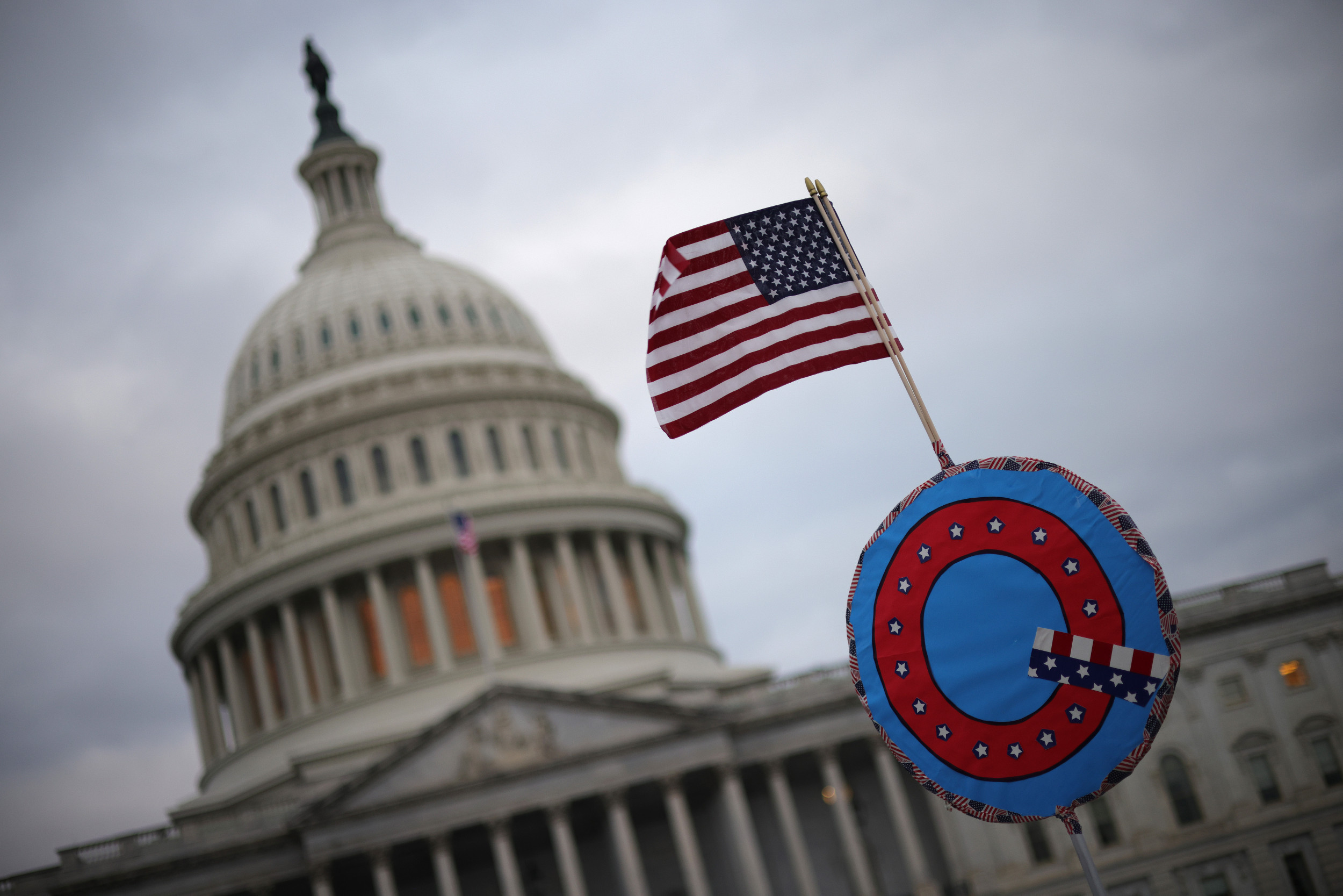 In QAnon Renaissance, Conspiracists Feast on Trump-Biden War of Words