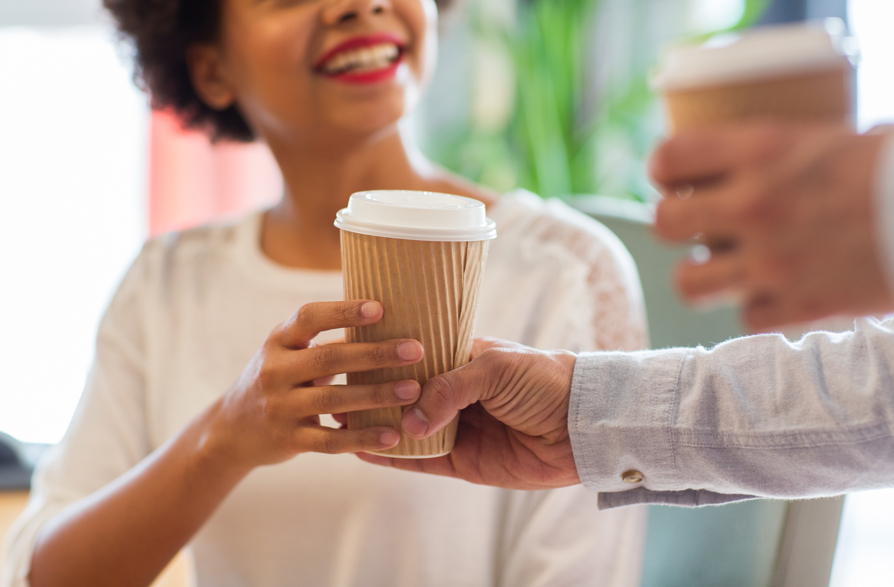 Give coffee. Happy woman Coffee hand. Hand taking Cup. Coffee giving hand.