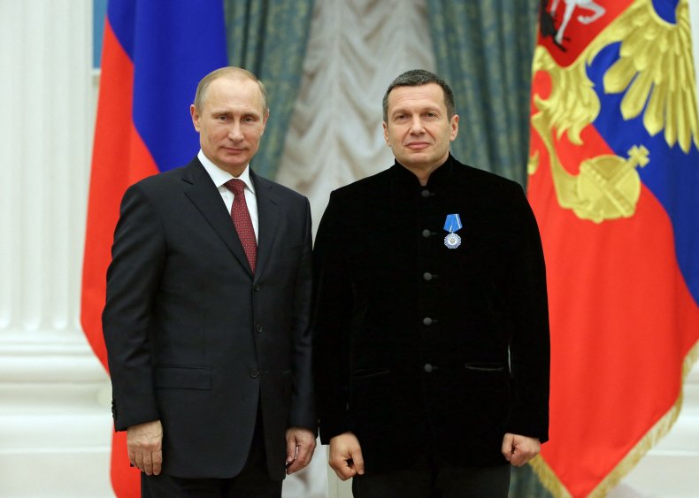 Vladimir Putin poses with Vladimir Solovyov