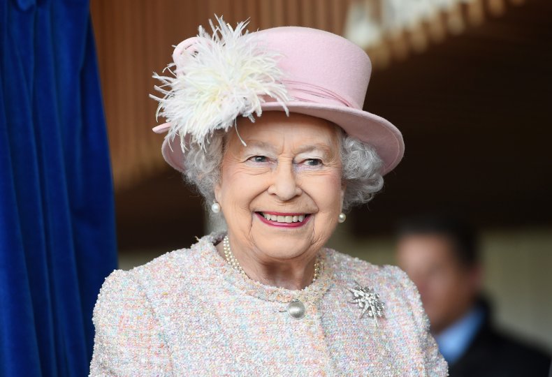 Queen Elizabeth II smiling in hat