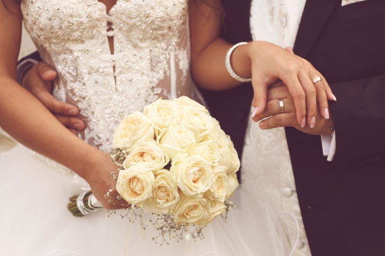 Woman slammed for wearing "off-white" dress wedding