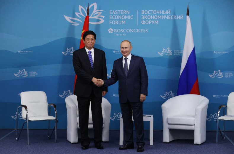 China's Top Officials Pledge Russia Support