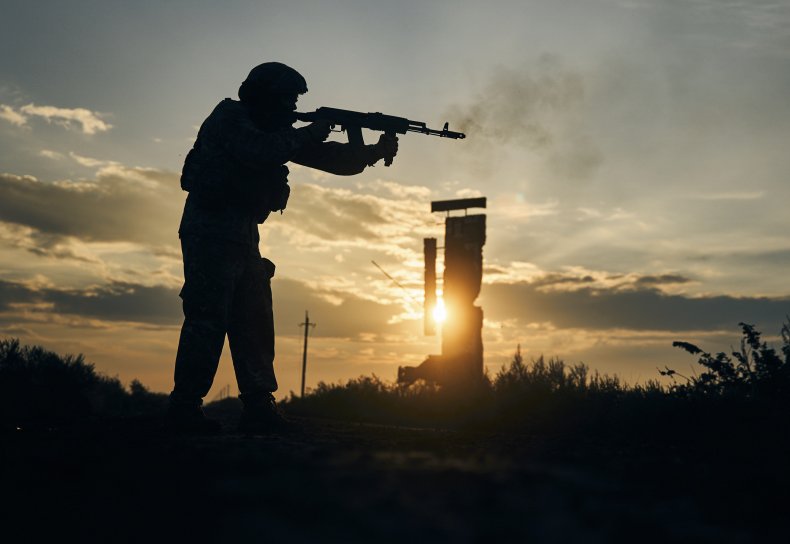A Ukrainian soldier shoots