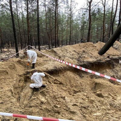 Forensic Technicians at Mass Grave Forensic Technicians at Mass Grave