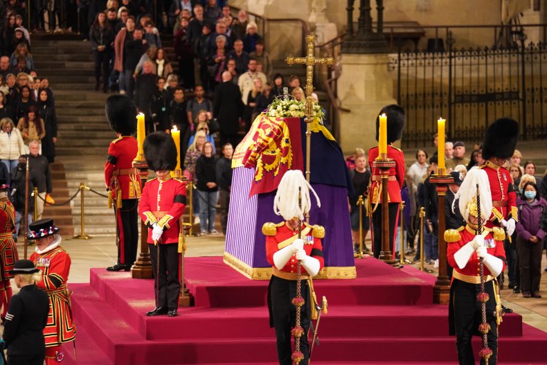 Mourners file past Queen's coffin in Westminster