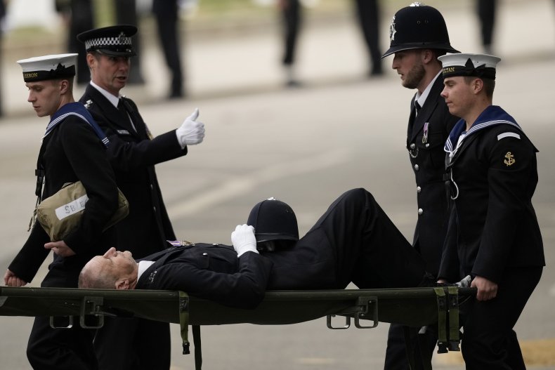 Policeman collapses before queen's funeral