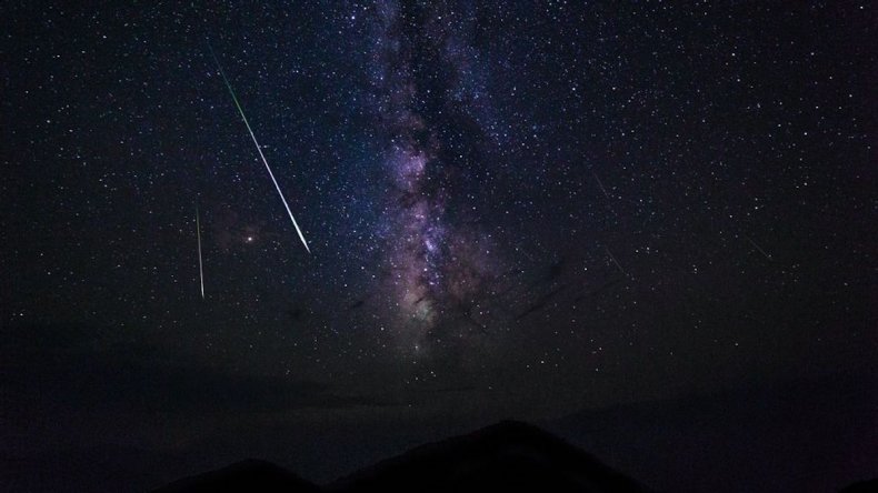 Meteor shooting through sky