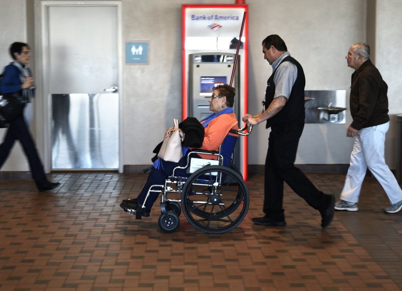 Passenger in Wheelchair at Airport