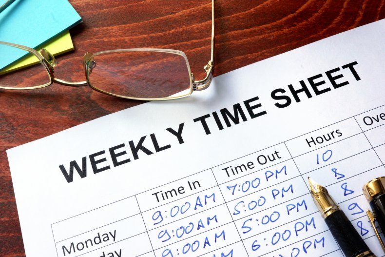 A completed weekly sheet on the table.