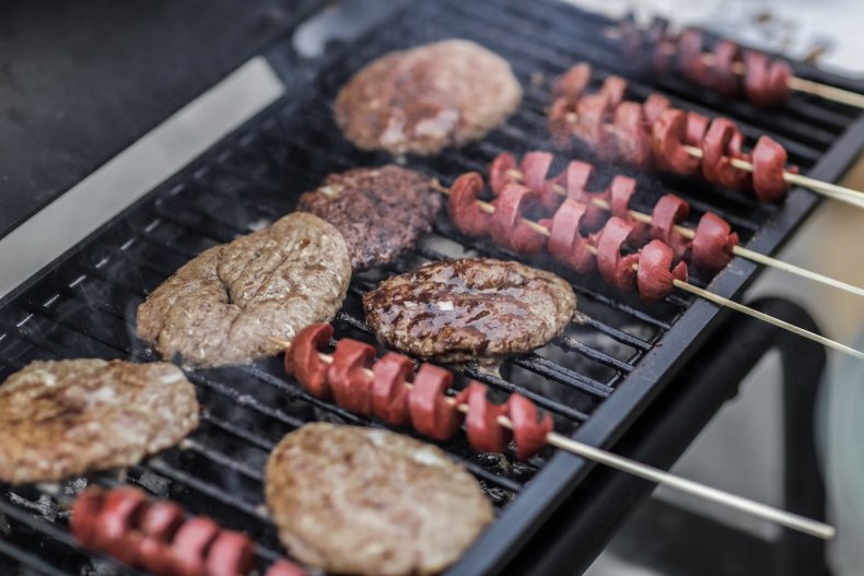 Hamburgers and sausage on grill