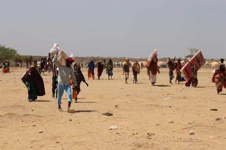 Displaced people arrive at the Iftin camp