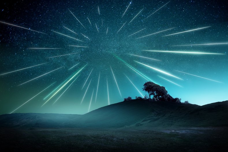 Illustration of a meteor shower over hills