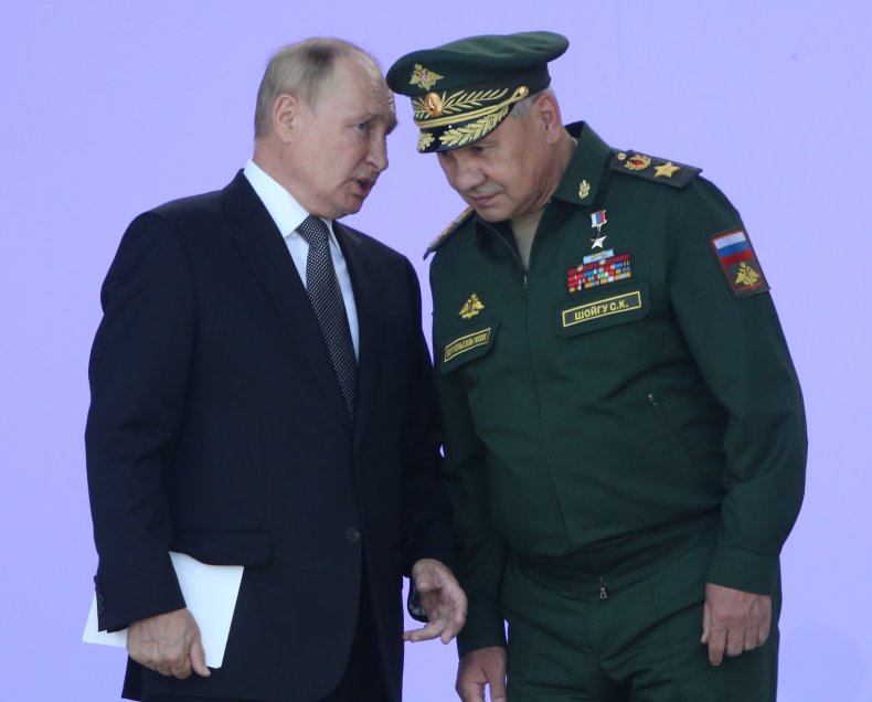 Russian President Vladimir Putin and Sergei Shoigu