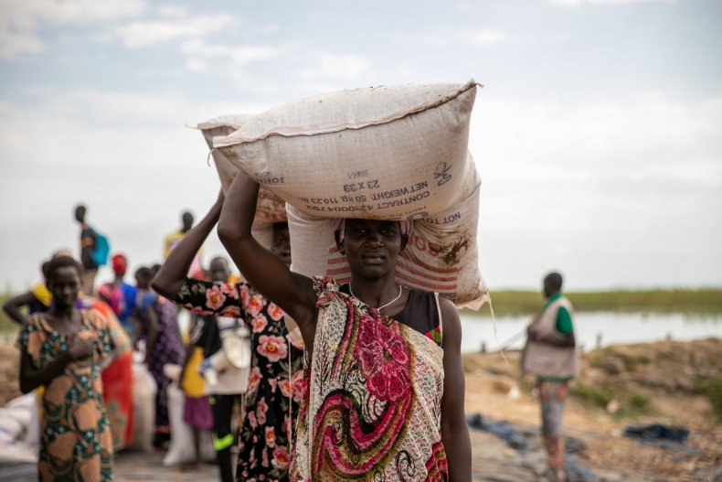 Women offload food at Nyal port