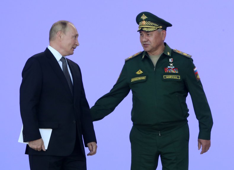 Russian President Vladimir Putin and Sergei Shoigu