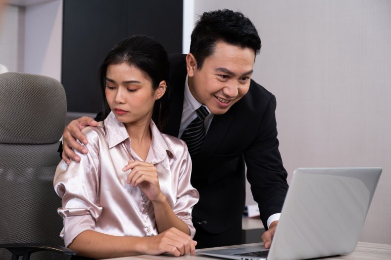 creepy co-worker puts hand on shoulder