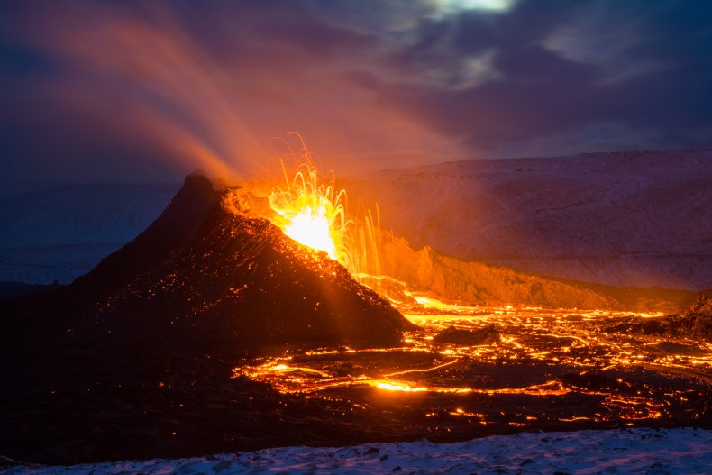 a volcano erupts